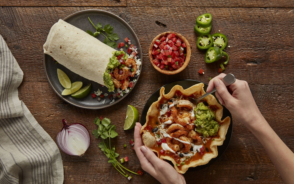 Fire Roasted Shrimp At Qdoba Is Served With Cilantro Lime Rice, Black Beans, Freshly Made Guacamole And Pico De Gallo