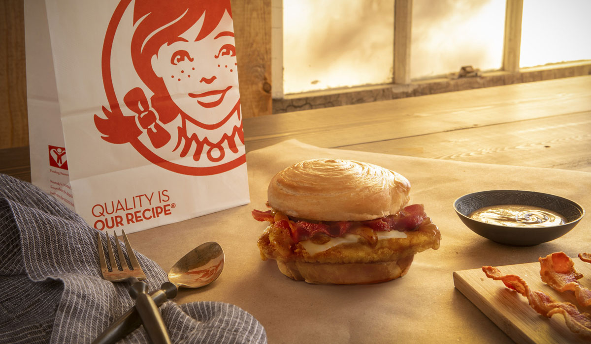 Wendy's Bacon Maple Chicken Sandwich Is Made With A Hot, Crispy Homestyle Chicken Fillet, Topped With Swiss Cheese, Three Strips Of Applewood Smoked Bacon And Drizzled With A Sweet Maple Glaze