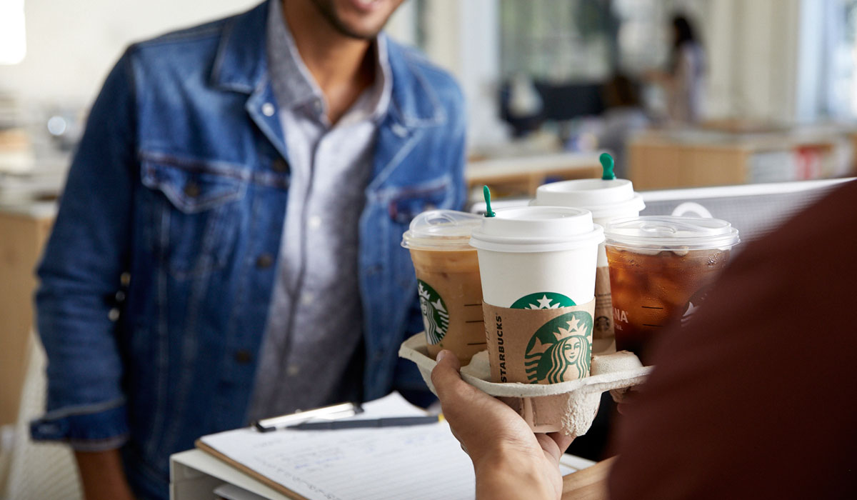 Starbucks Customers Getting Coffee