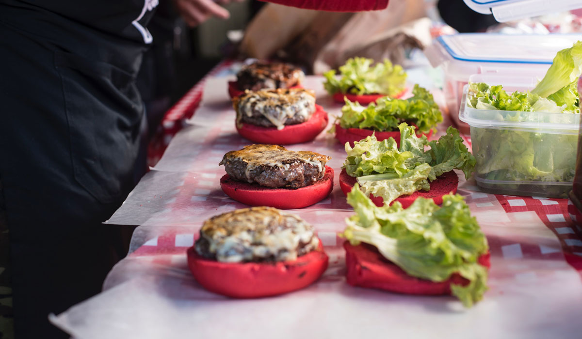 A Restaurant Worker Makes Burgers