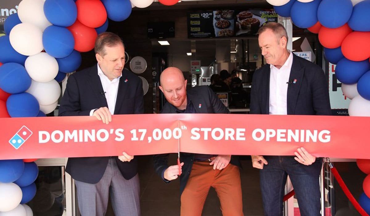 Domino's Executives Cut The Ribbon On A New Opening