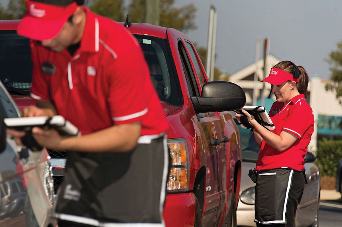 Chick Fil A Employees Take Order In Drive Thru Lane