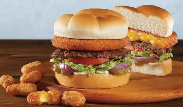 The Culver’s Deluxe ButterBurger is topped with a crown of golden-fried cheese, offering a warm, buttery crunch and gooey cheddar in every bite.