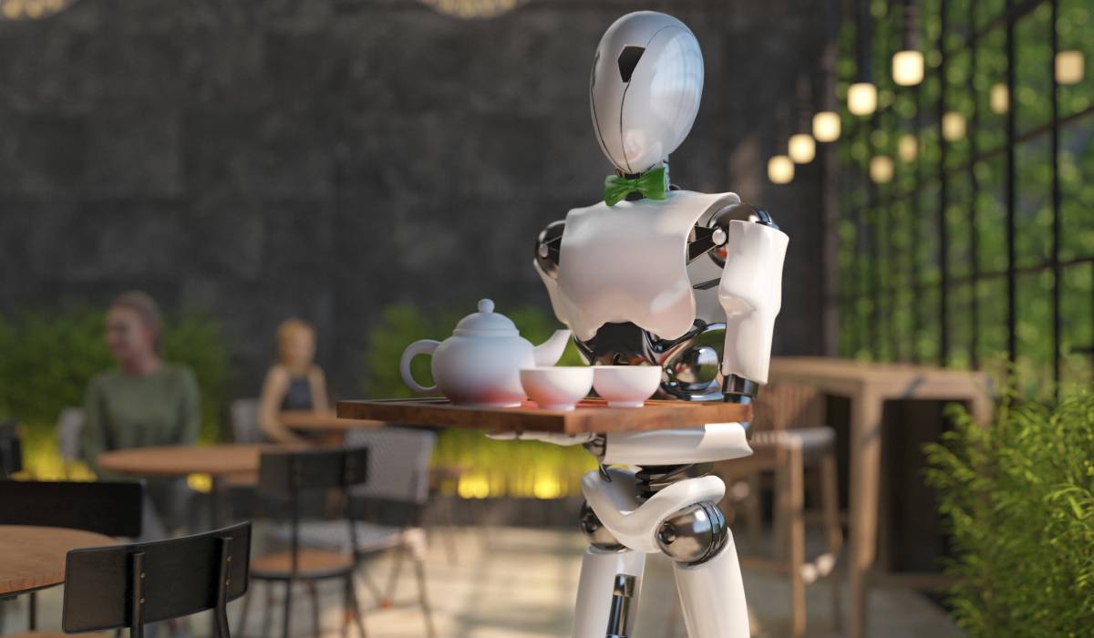 Robot waiter carries drinks to a table.