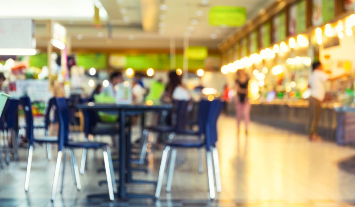 Blurred image of a food court.