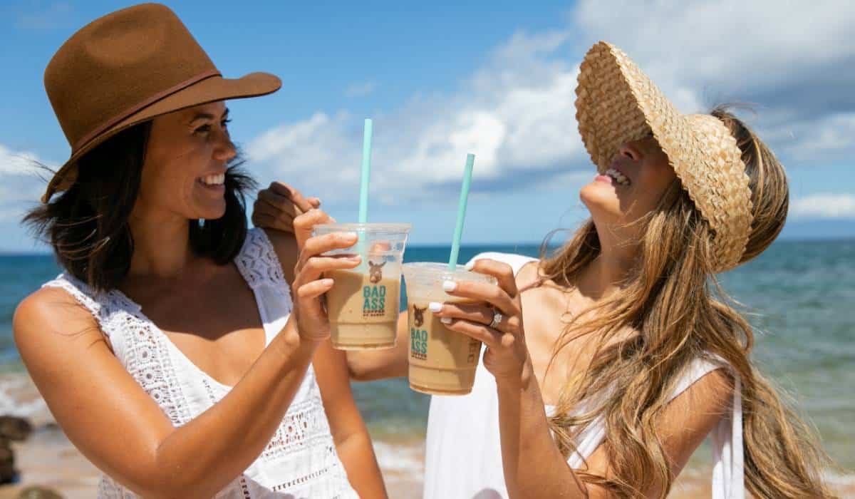 Customers enjoying beverages from Bad Ass Coffee of Hawaii.