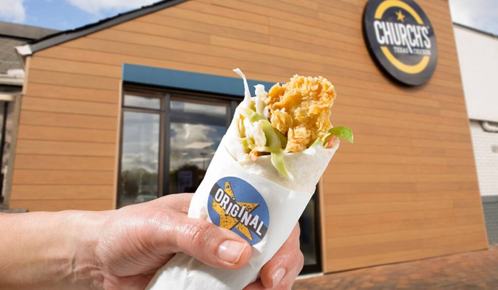 Church’s Texas Chicken wrap in a customer's hand.
