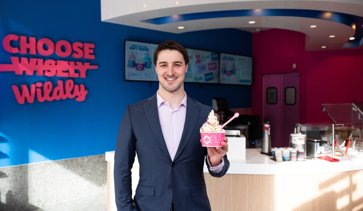 Neil Hershman inside a 16 Handles store.
