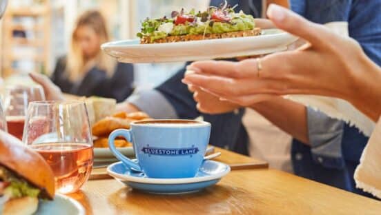 Bluestone Lane customers eating at a table.