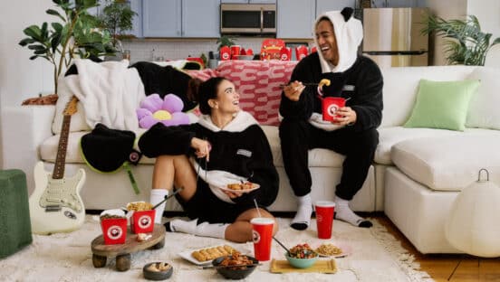 Customers modeling some of the merchandise from Panda Express.