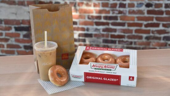 Krispy Kreme doughnuts alongside McDonald's packaging.
