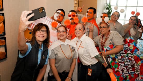 Whataburger CEO Debbie Stroud and Whataburger employees.