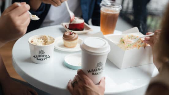 Customers eating at Magnolia Bakery.