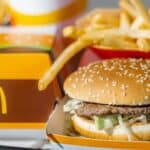 McDonald's burger and fries on a tray.