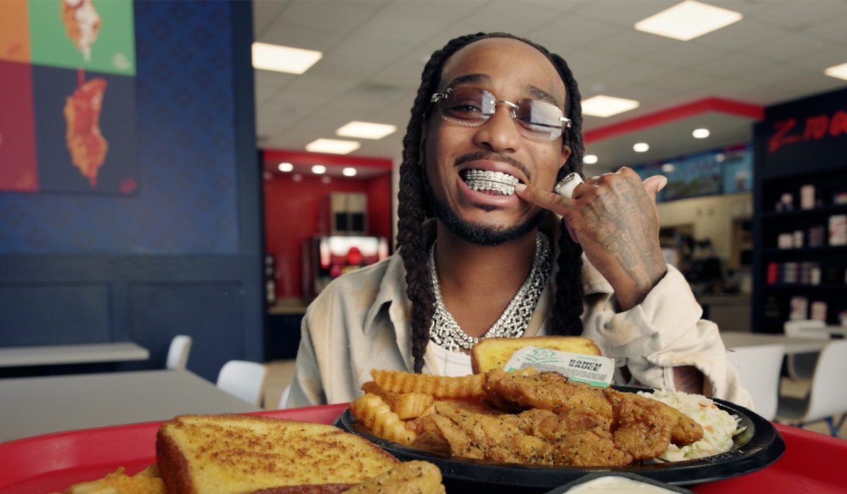 Quavo with Zaxbys' new Lemon Pepper Wings.