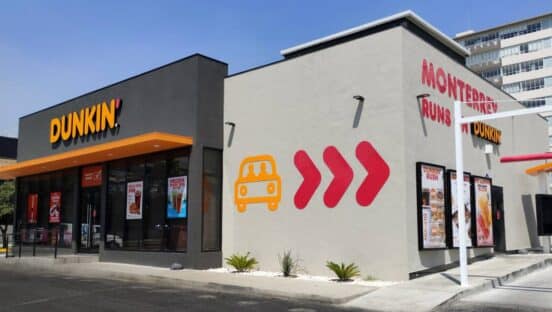 Dunkin' restaurant outside with drive-thru.