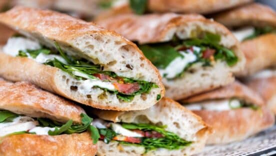 Sandwiches stacked on each other.