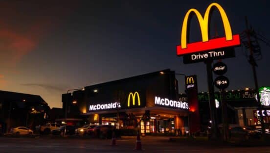 McDonald's restaurant shown at night.