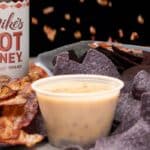 Papa Johns along with Mike's Hot Honey and queso.