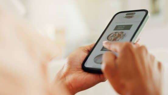 Restaurant app in the hand of a customer.